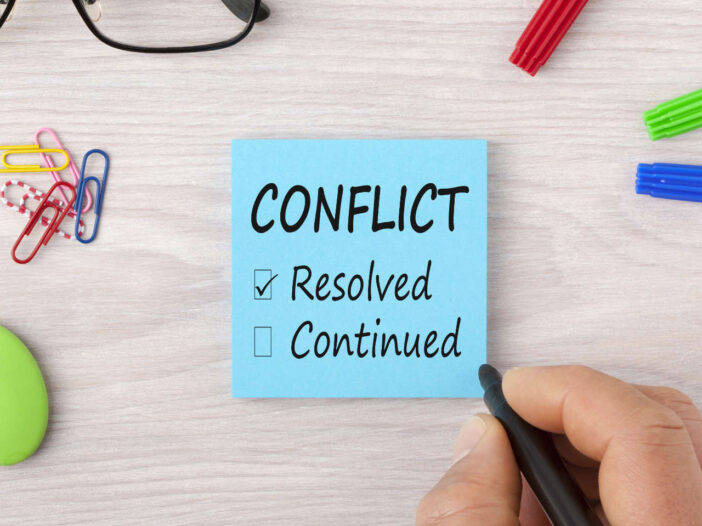 conflict management sign on desk