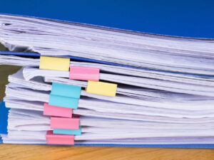 health and safety policies and procedures stack of papers