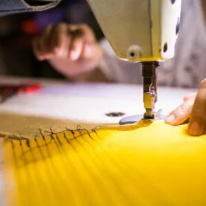 a close-up of a sewing machine to symbolise modern slavery