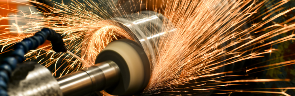 Abrasive wheel in use with sparks flying