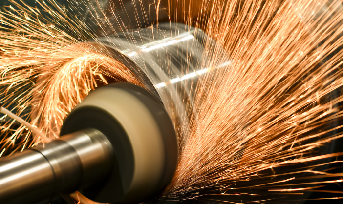 Abrasive wheel in use with sparks flying