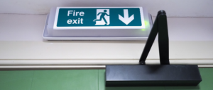 Fire exit sign above fire door.
