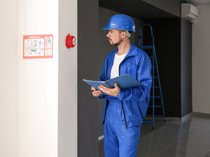 fire risk assessor carrying out a fire risk assessment