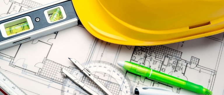 CDM Regulations image - hard hat with construction diagrams