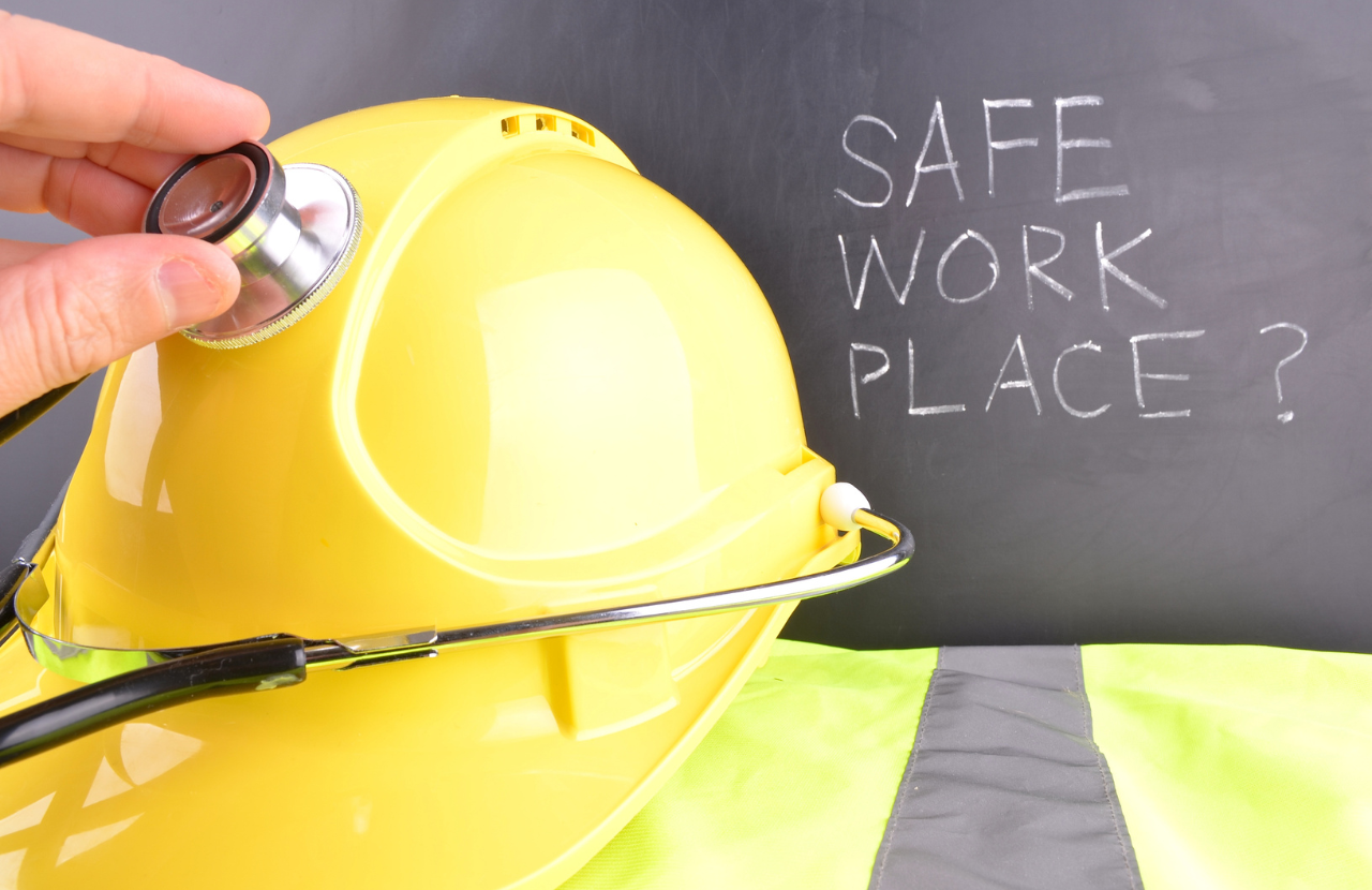 PPE and a blackboard on which is written 'safe work place?'