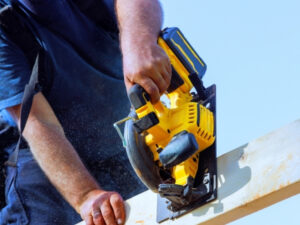 Hand Arm Vibration Awareness thumbnail - a worker using a handheld electric saw