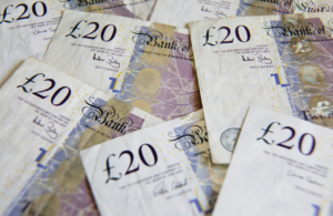 Arrangement of twenty pound notes to illustrate how many stages of money laundering are there