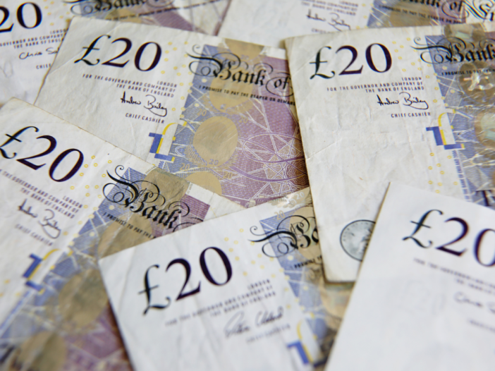 Arrangement of twenty pound notes to illustrate how many stages of money laundering are there