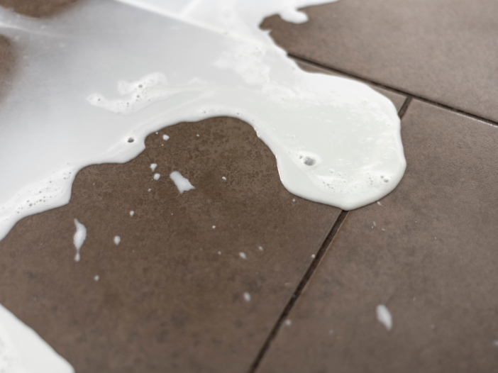 Soapy water spillage on floor tiles