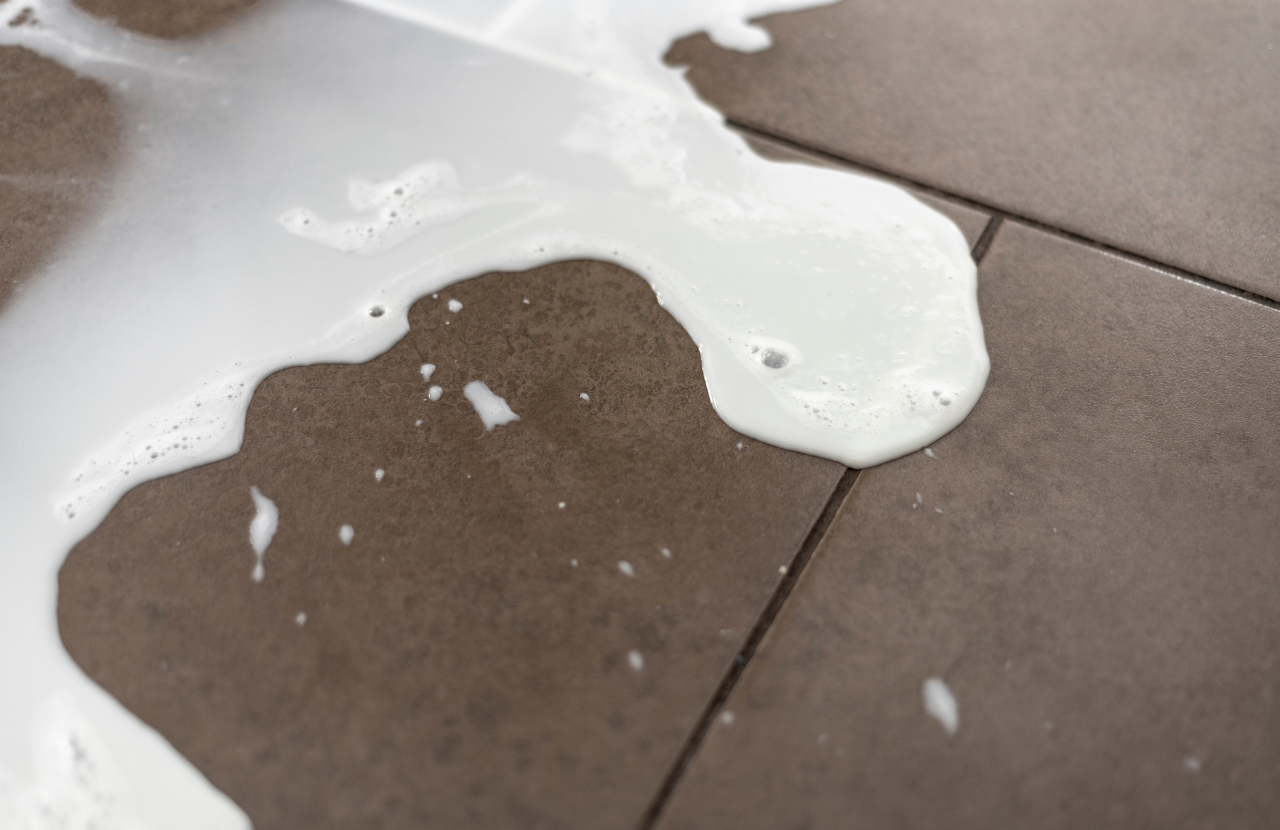 Soapy water spillage on floor tiles