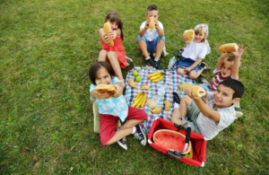 Group of children on a school picnic to illustrate allergy training for schools - Benedict's Law