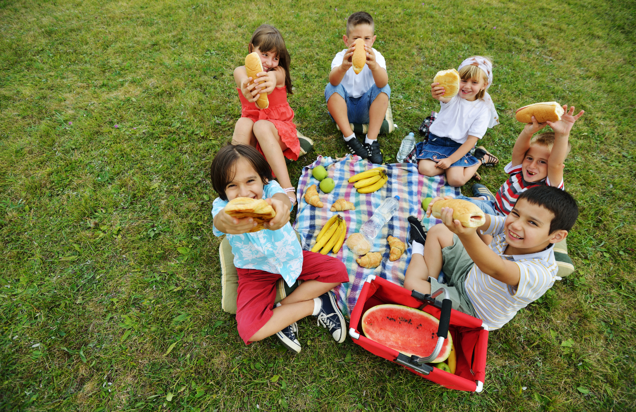 Group of children on a school picnic to illustrate allergy training for schools - Benedict's Law