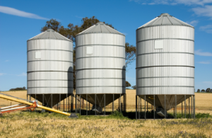 Three grain silos to illustrate definition of a confined space